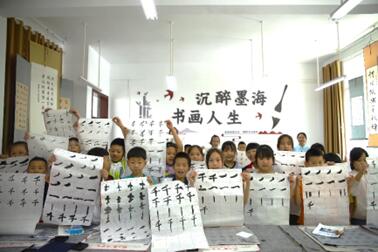 執(zhí)筆書(shū)塘埡，共繪振興圖